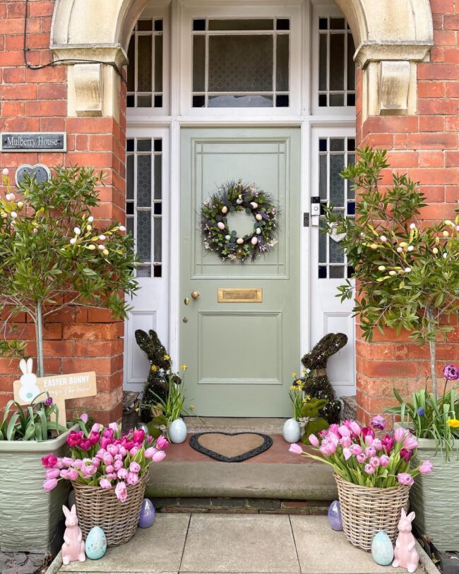 Charming Green Door Adorned with Tulips