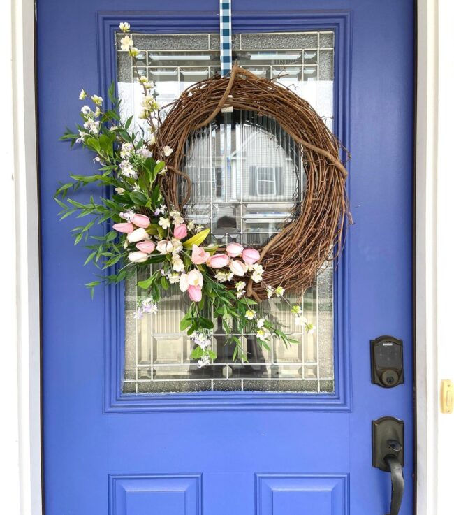 Charming Wreath Adorning Bright Blue Door