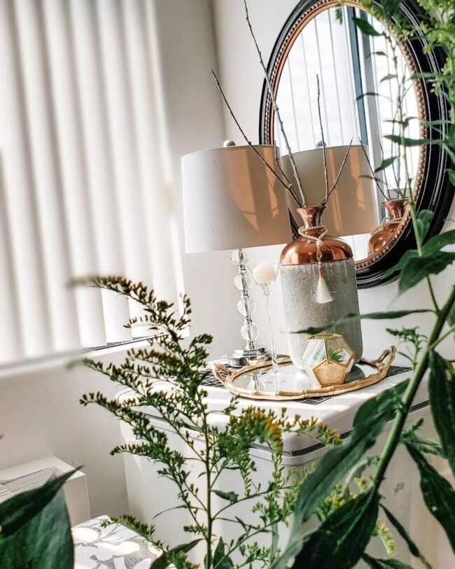 Fresh Console Table Featuring Lush Greenery