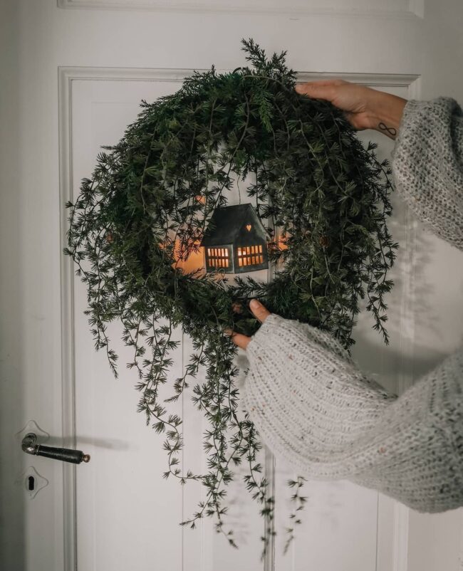 A Lantern-Centered Wreath for a Forest Feel