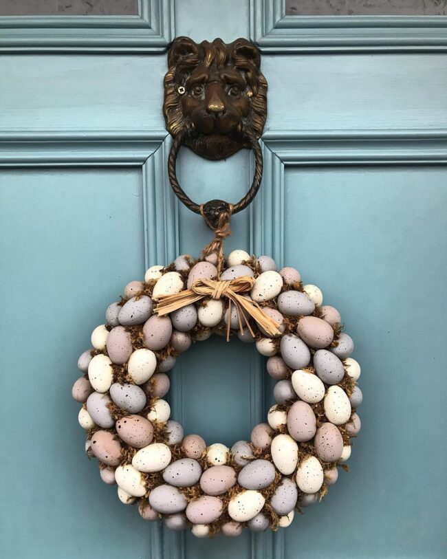 Pastel Egg Decor on Blue Door