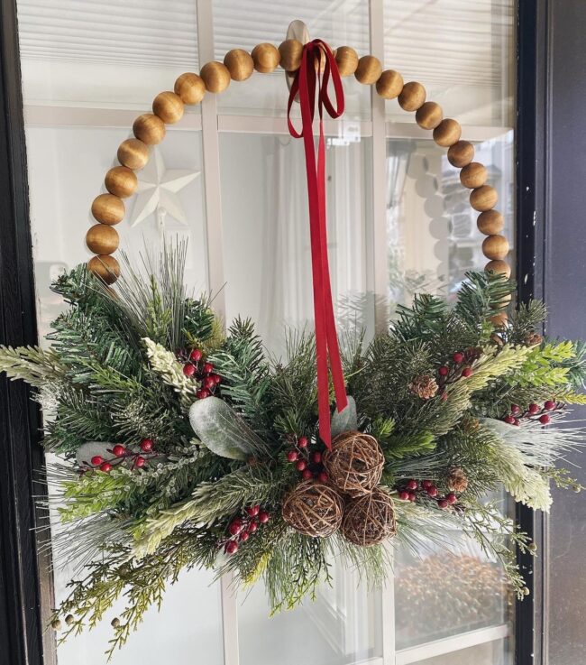 A Beaded Wreath with a Bold Red Ribbon